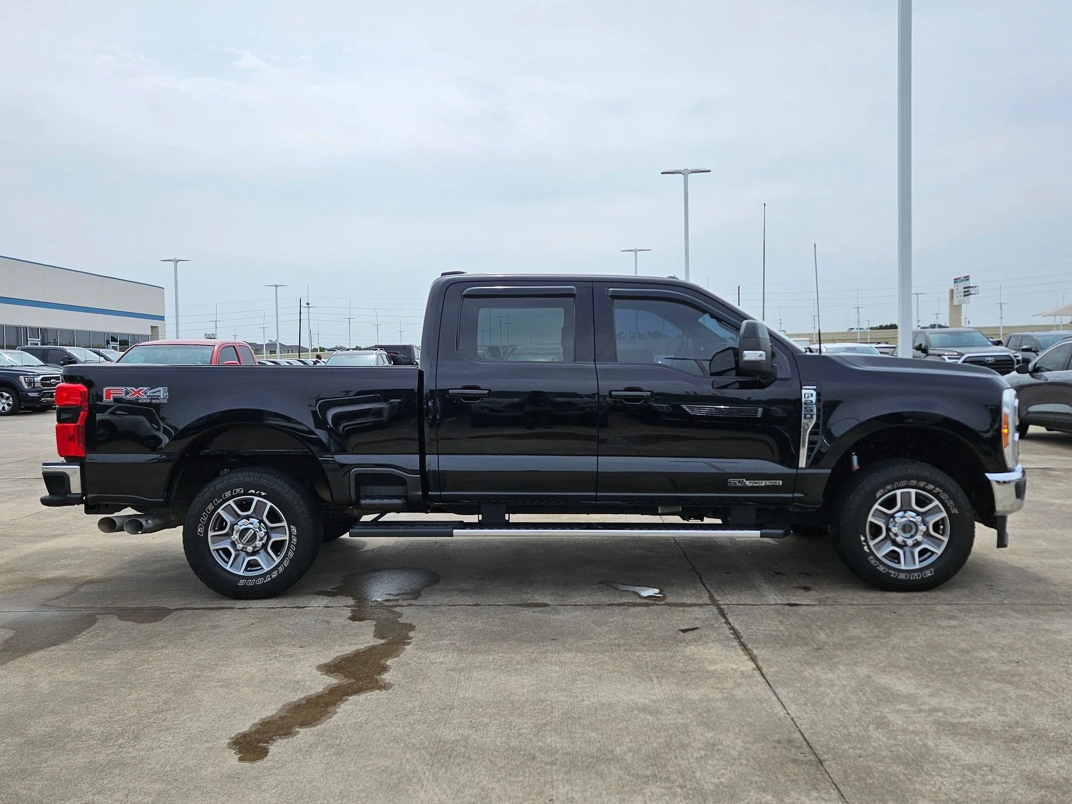 Used 2023 Black Metallic Ford Lariat image 2