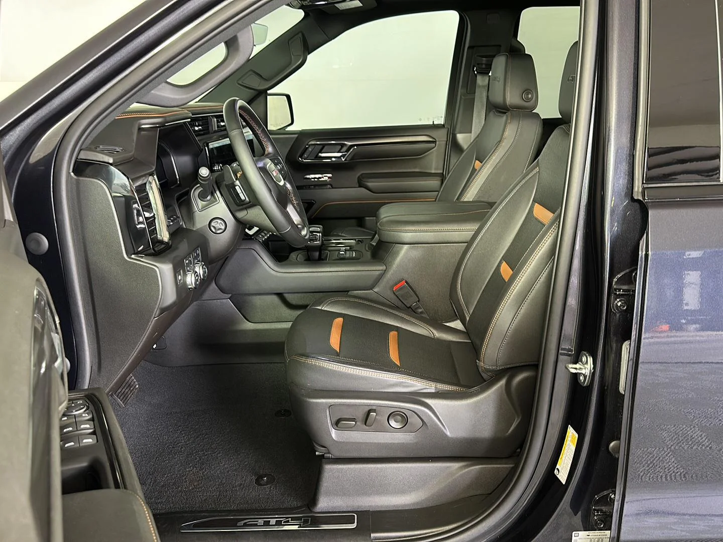 Used 2023 Titanium Rush Metallic GMC AT4 image 7