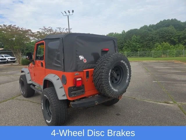 Used 2005 Impact Orange Cle Jeep Sport image 19