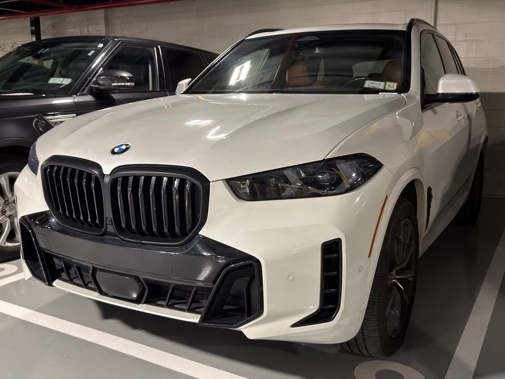 Used 2024 White Metallic BMW xDrive40i image 1
