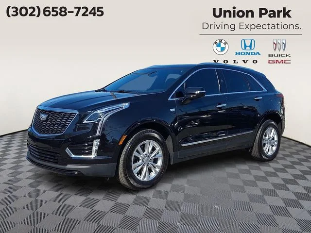 Used 2024 Black Metallic Cadillac Luxury image 1