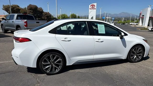 Used 2022 Black Sand Pearl Toyota SE image 3