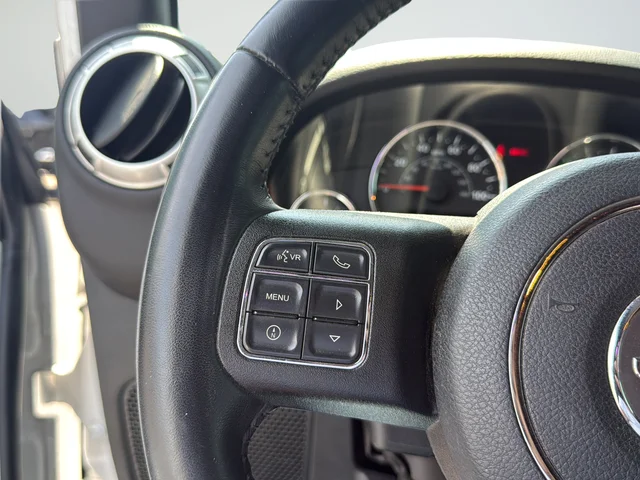 Used 2017 White Jeep Unlimited Sahara image 16