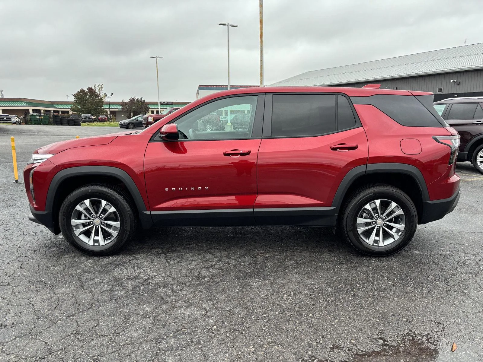Used 2027 Radiant Red Tintcoat Chevrolet AWD LT image 4
