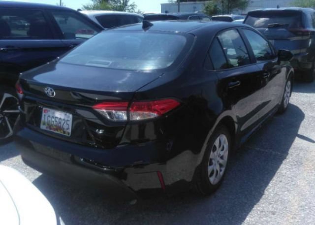 Used 2024 Midnight Black Metallic Toyota LE image 5