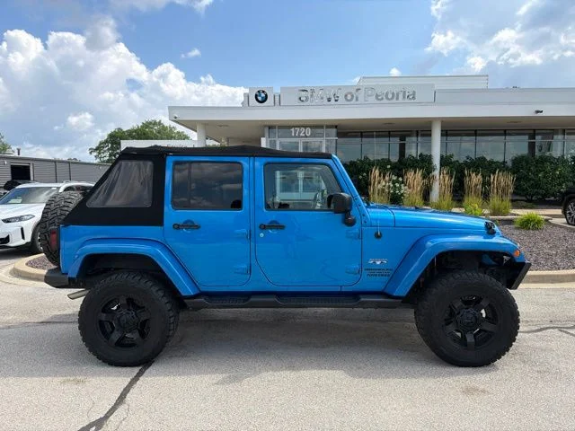 Used 2016 Blue Jeep Unlimited Sahara image 5