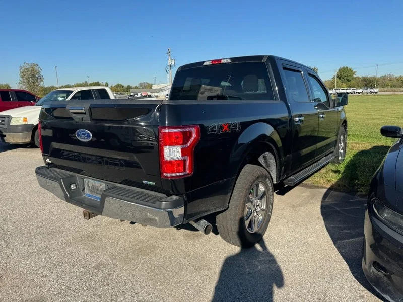 Used 2019 Agate Black Metallic Ford XLT 4WD SuperCrew 5.5