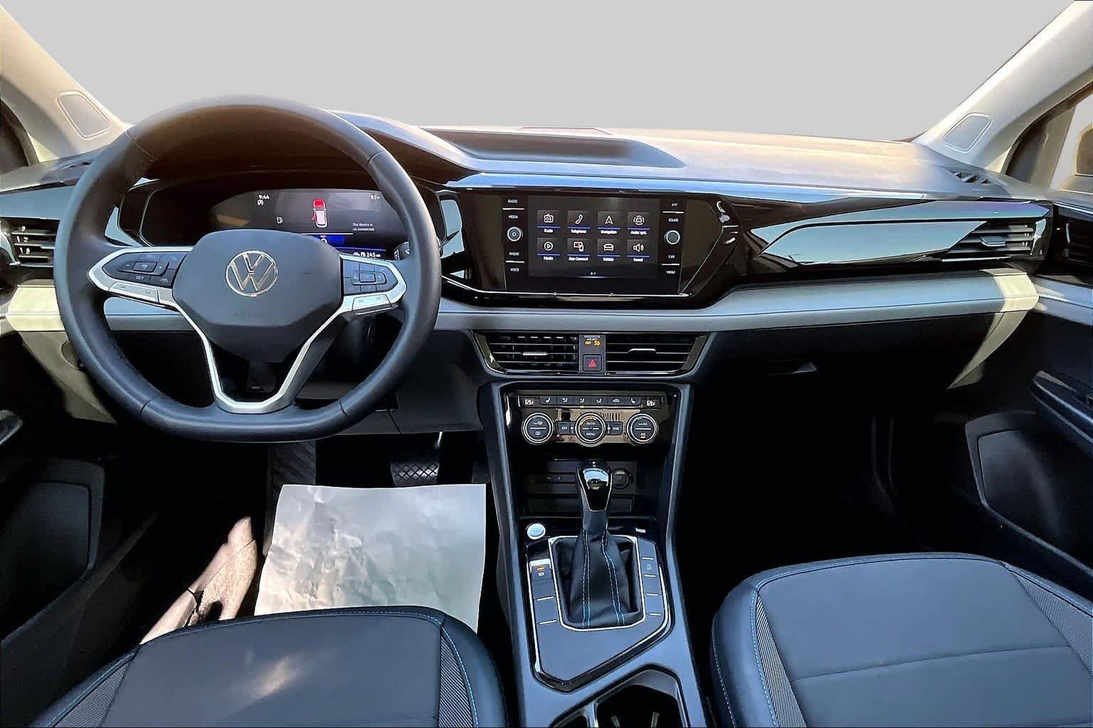 Used 2024 Pure White w/ Deep Black Roof Volkswagen SE Black image 16