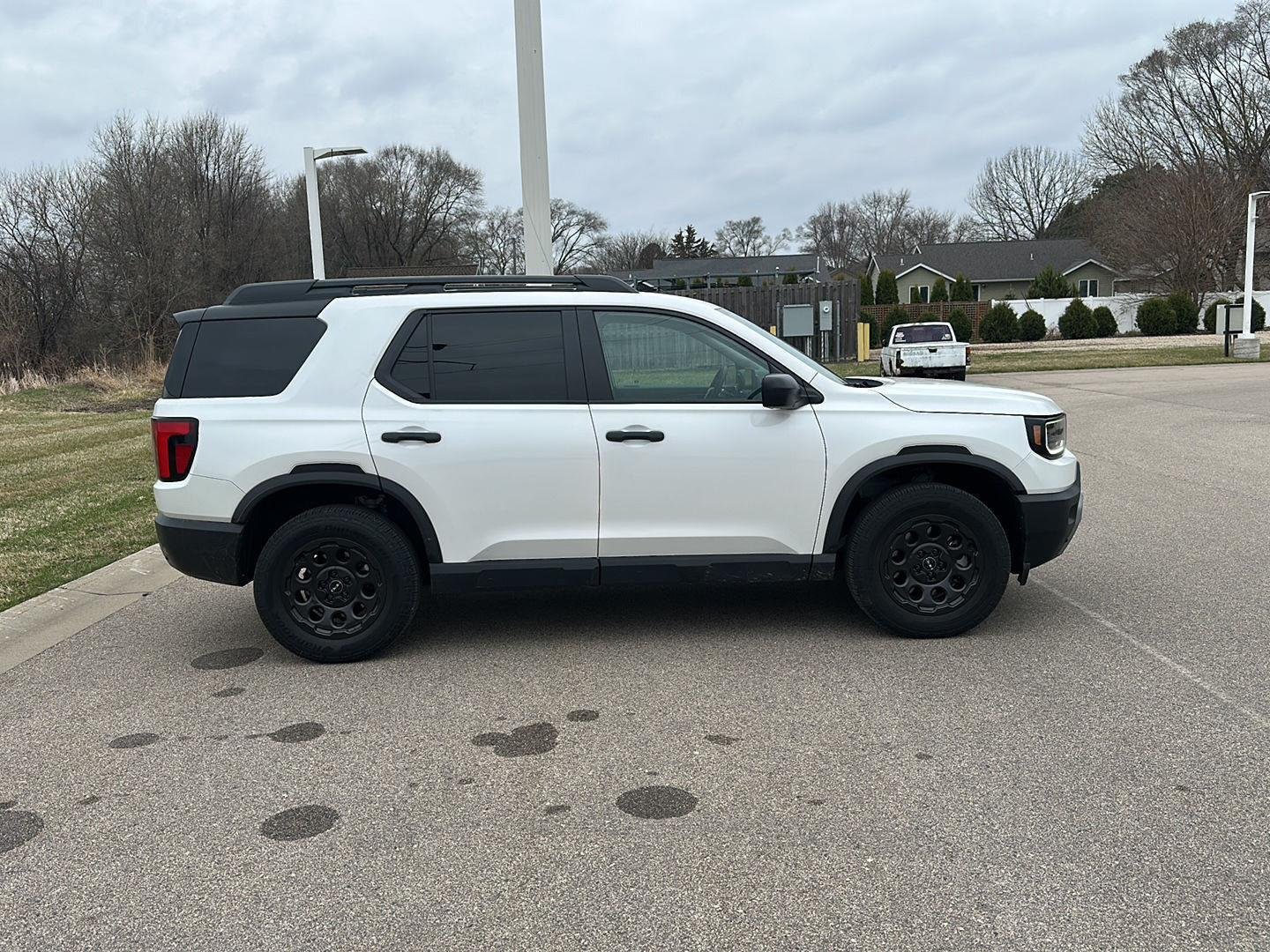 Used 2026 Honda Passport RTL Blackout with VIN 5FNYF9H33TB027963 for sale in Winona, Minnesota