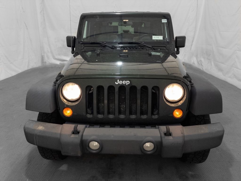 Used 2010 Jeep Wrangler Sport with VIN 1J4AA2D14AL153443 for sale in Lansing, MI