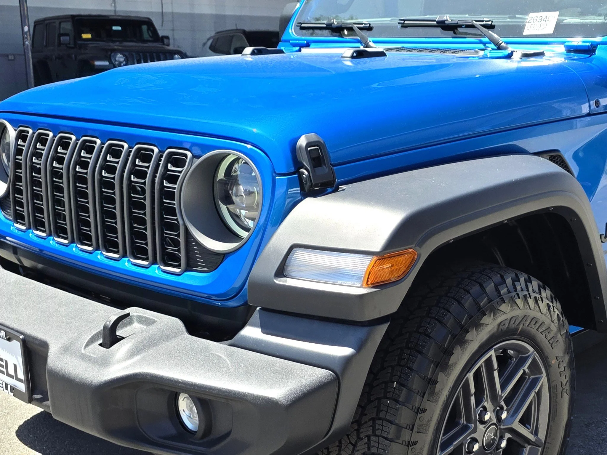 New 2026 Blue Pearl Jeep Sport S image 8