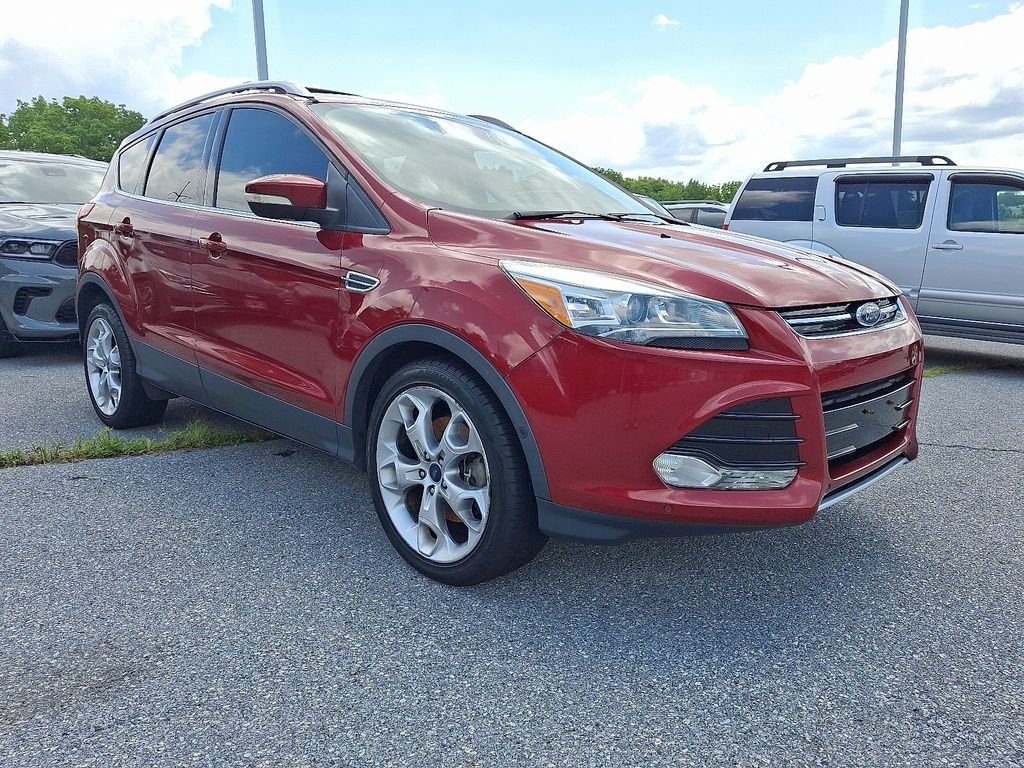 Used 2016 Red Ford Titanium image 1