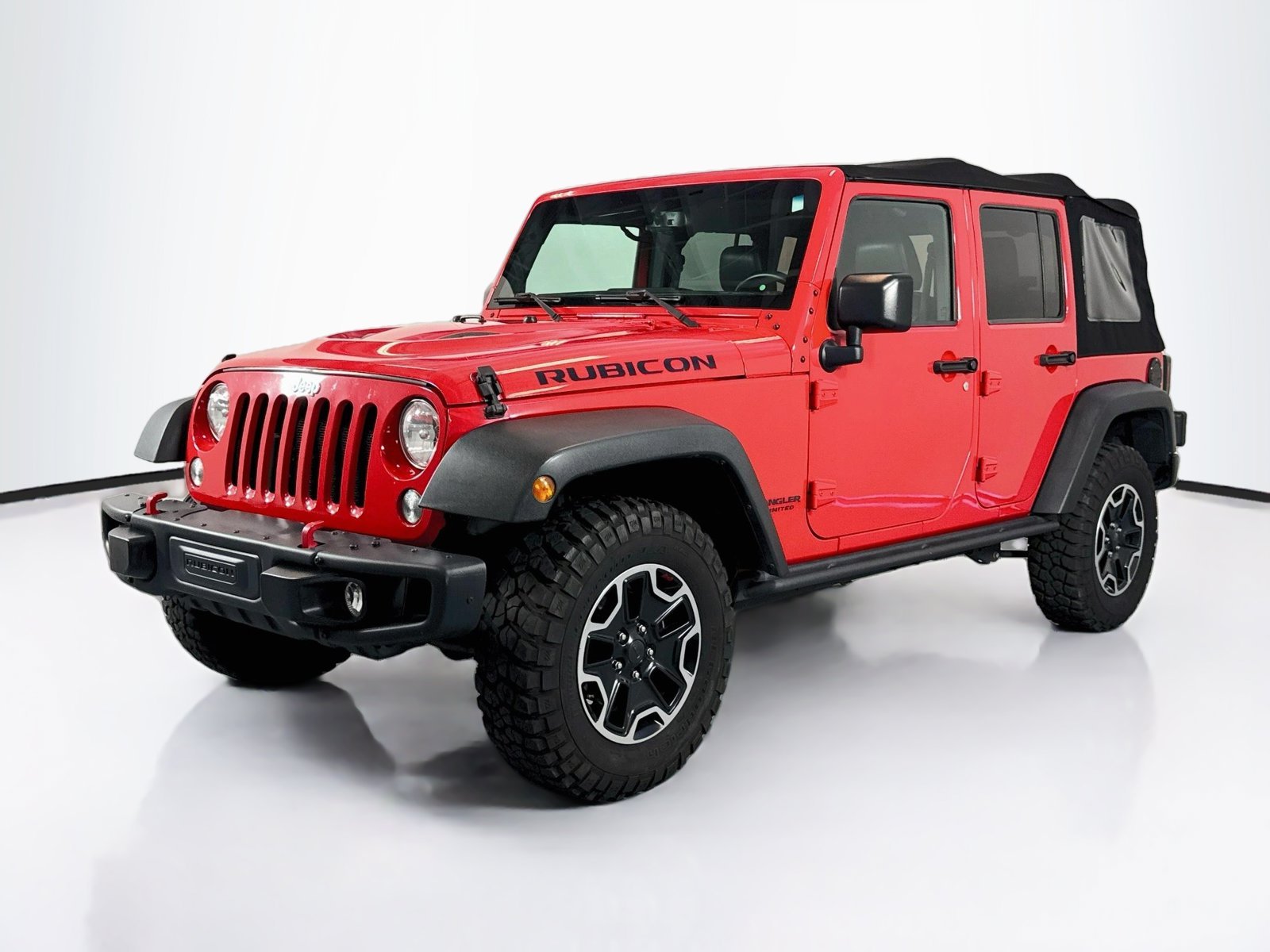Used 2016 Firecracker Red Clearcoat Jeep Rubicon Hard Rock image 1