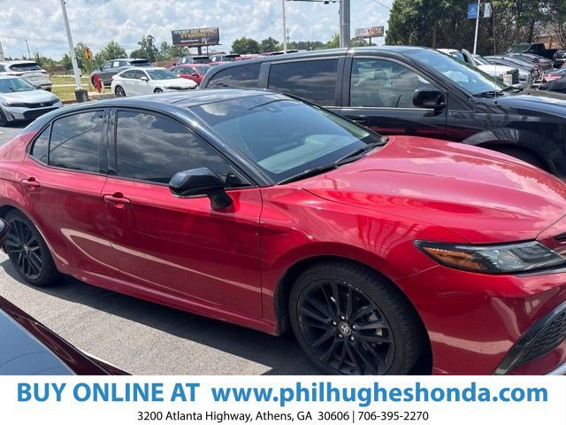 Used 2022 Midnight Black Metallic Toyota XSE image 1