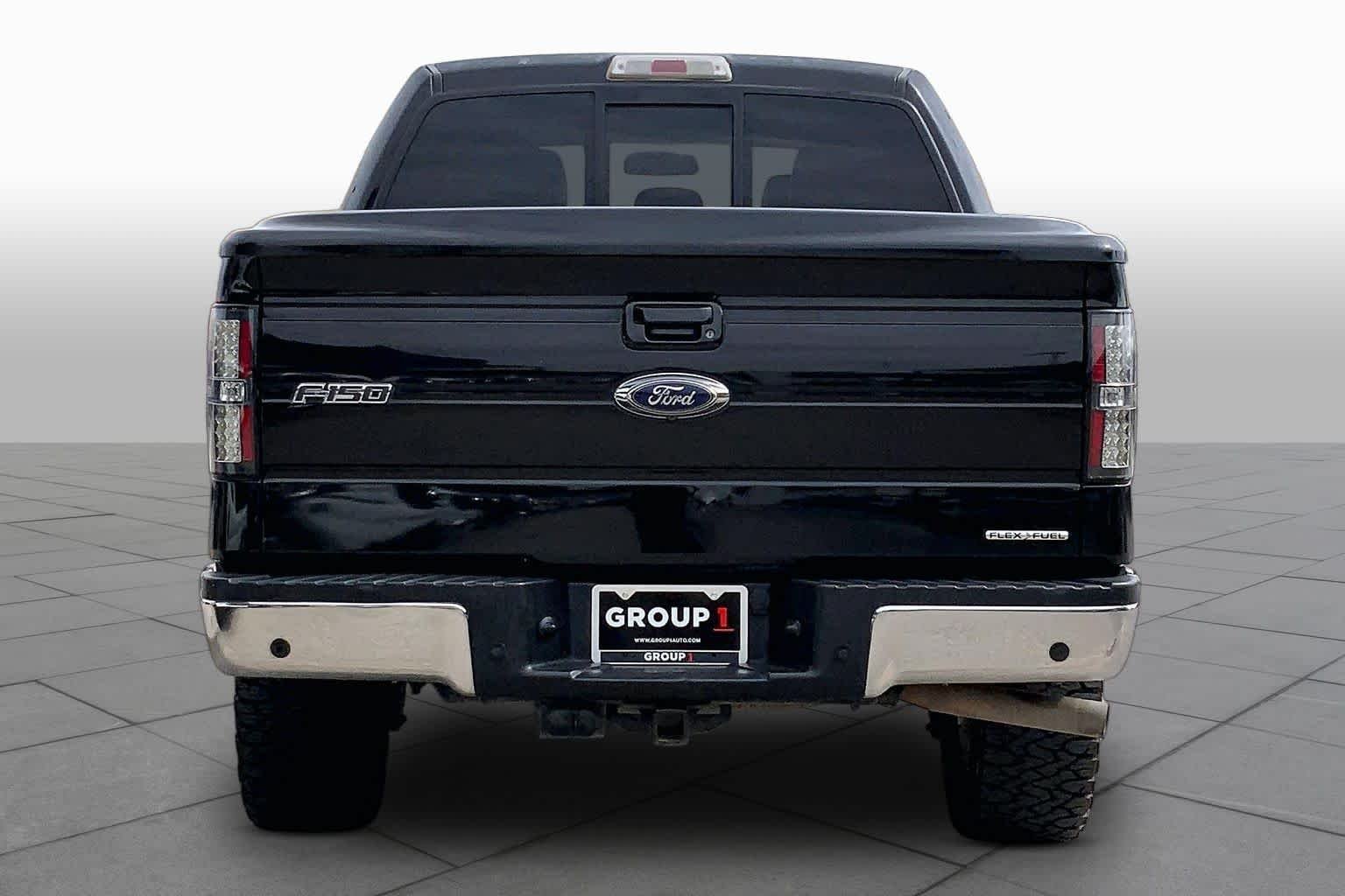 Used 2013 Tuxedo Black Metallic Ford Lariat image 4