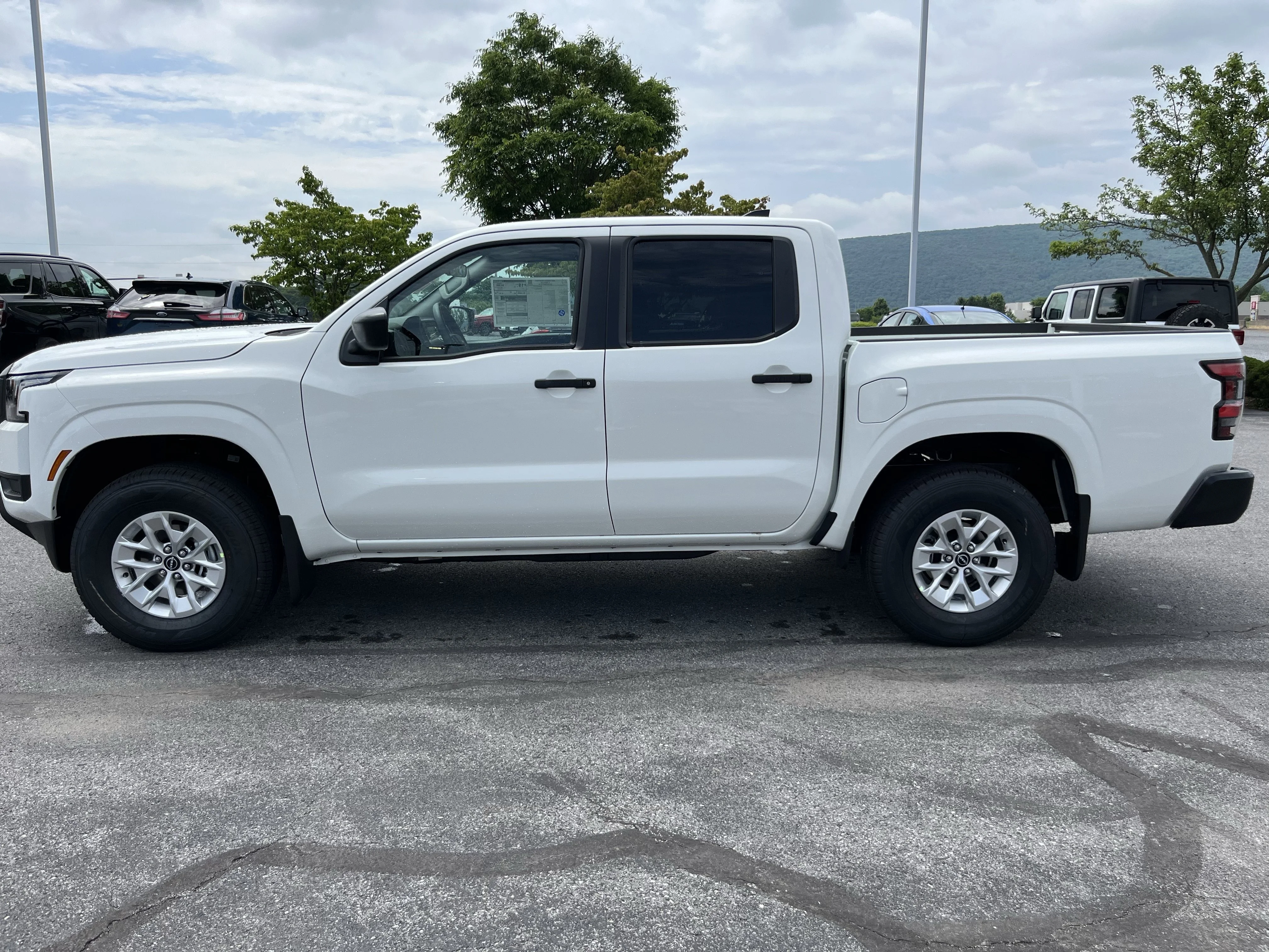New 2026 Glacier White Nissan Crew Cab S image 9