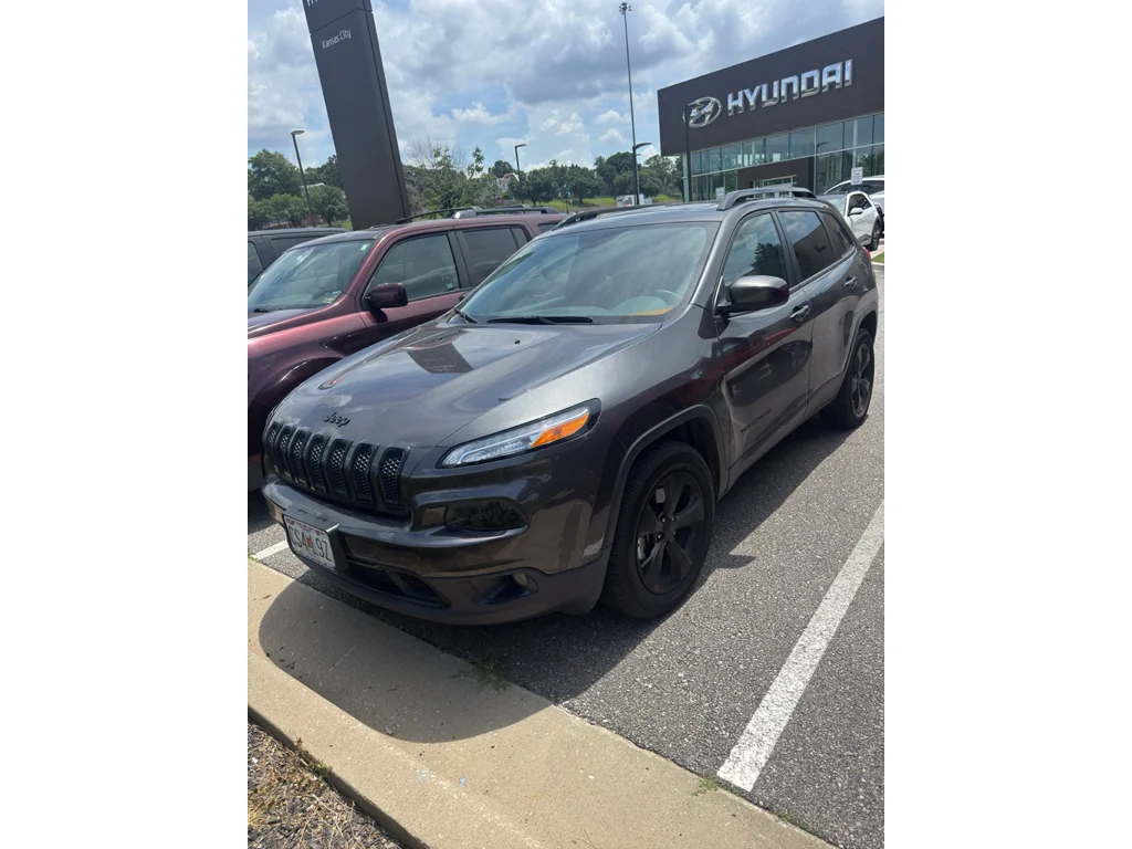 Used 2016 Brilliant Black Crystal Pearlcoat Jeep Altitude image 1