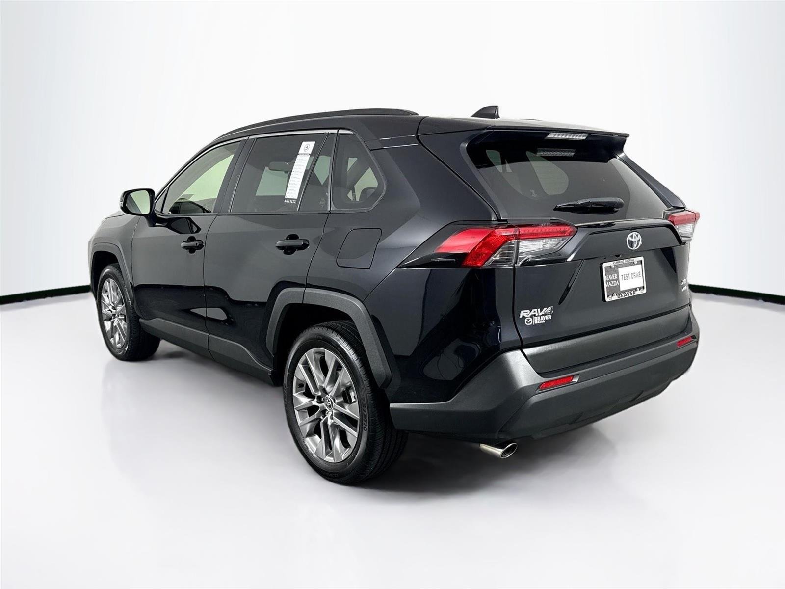 Used 2025 Midnight Black Metallic Toyota XLE Premium image 12