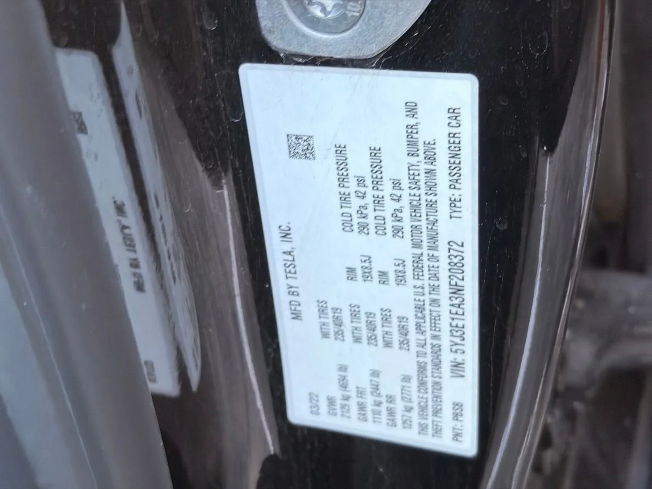 Used 2022 Solid Black Tesla Base image 10