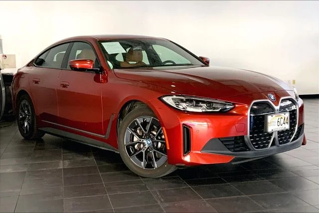 Used 2023 Sunset Orange Metallic BMW eDrive35 image 2