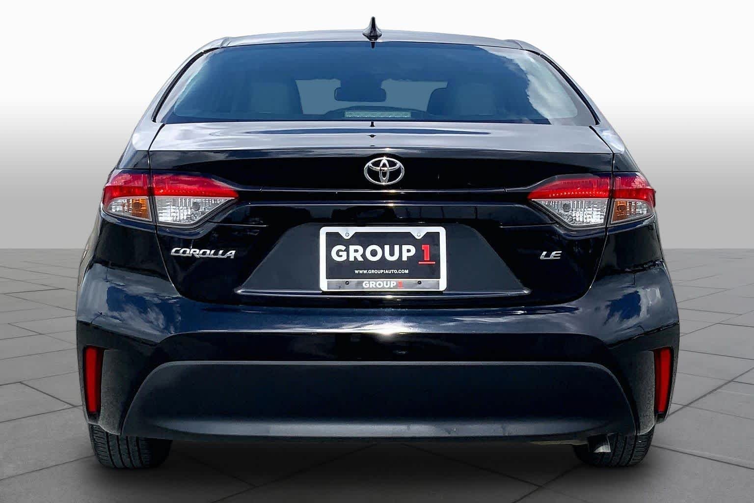Used 2024 Midnight Black Metallic Toyota LE image 5