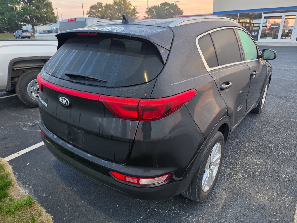 Used 2018 Black Cherry Kia LX image 4