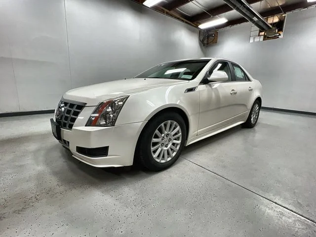 Used 2013 White Cadillac Luxury image 1