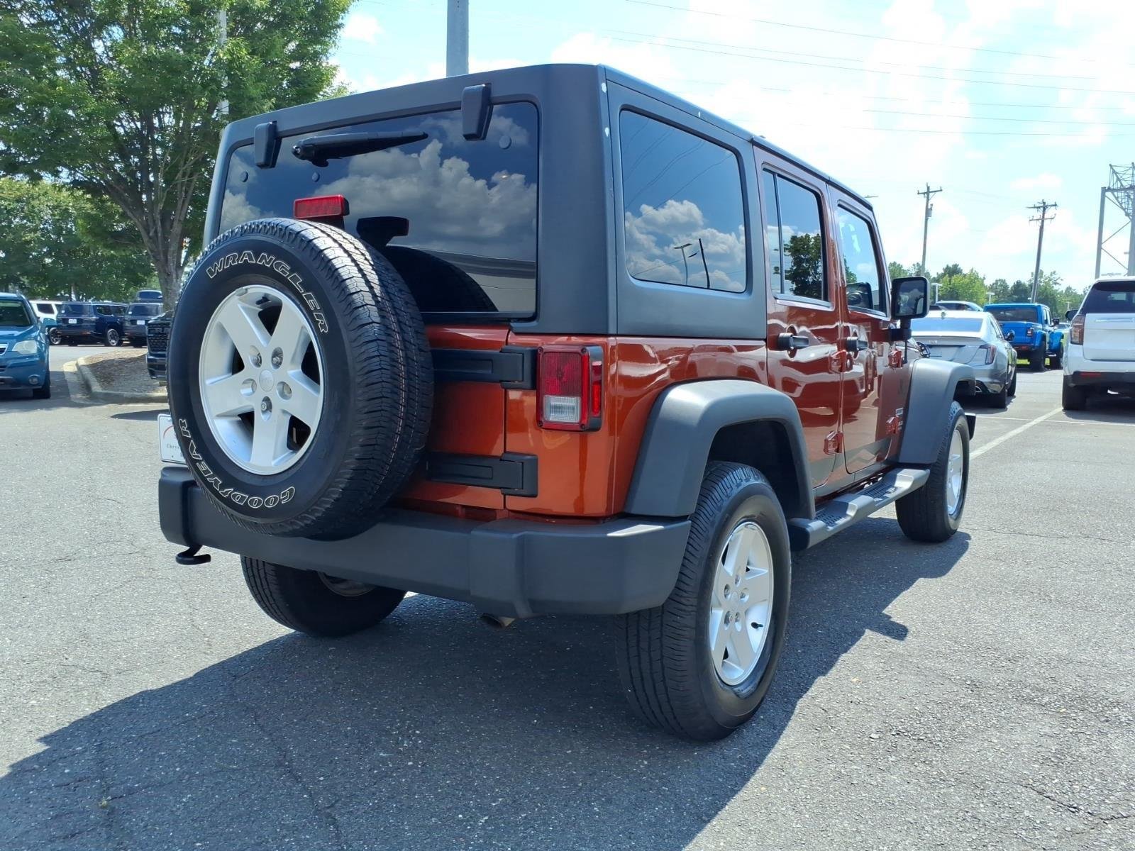 Used 2014 Jeep Wrangler Unlimited Sport with VIN 1C4BJWDG4EL203138 for sale in Fort Mill, SC
