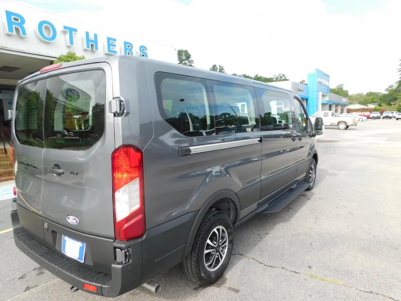 New 2026 Carbonized Gray Metallic Ford Passenger Van XLT image 8
