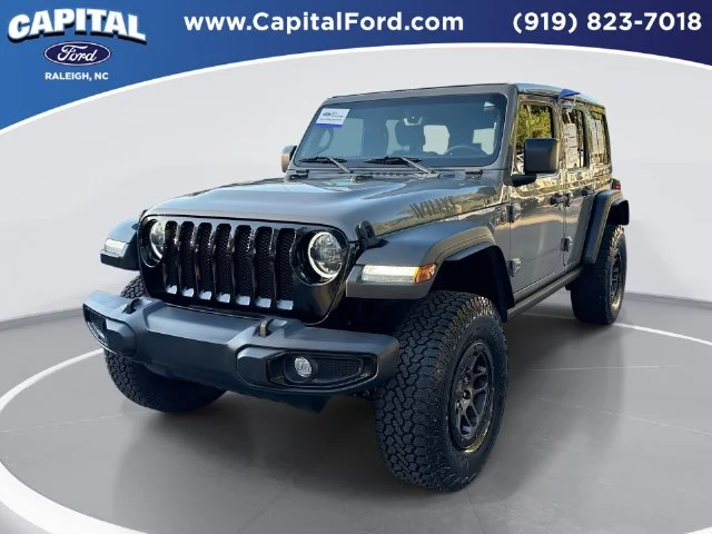 Used 2023 Gray Jeep Sport image 1