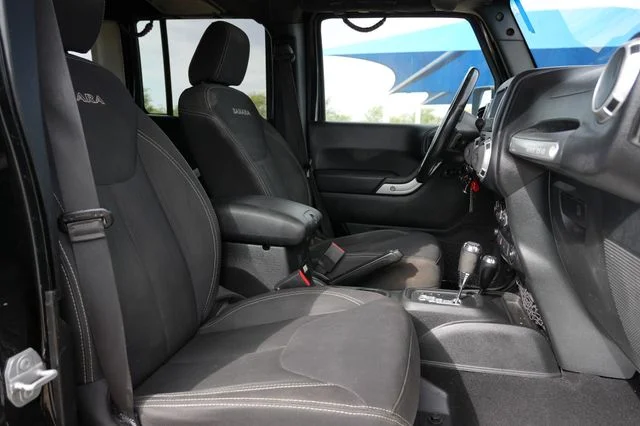 Used 2018 Black Jeep Unlimited Sahara image 16