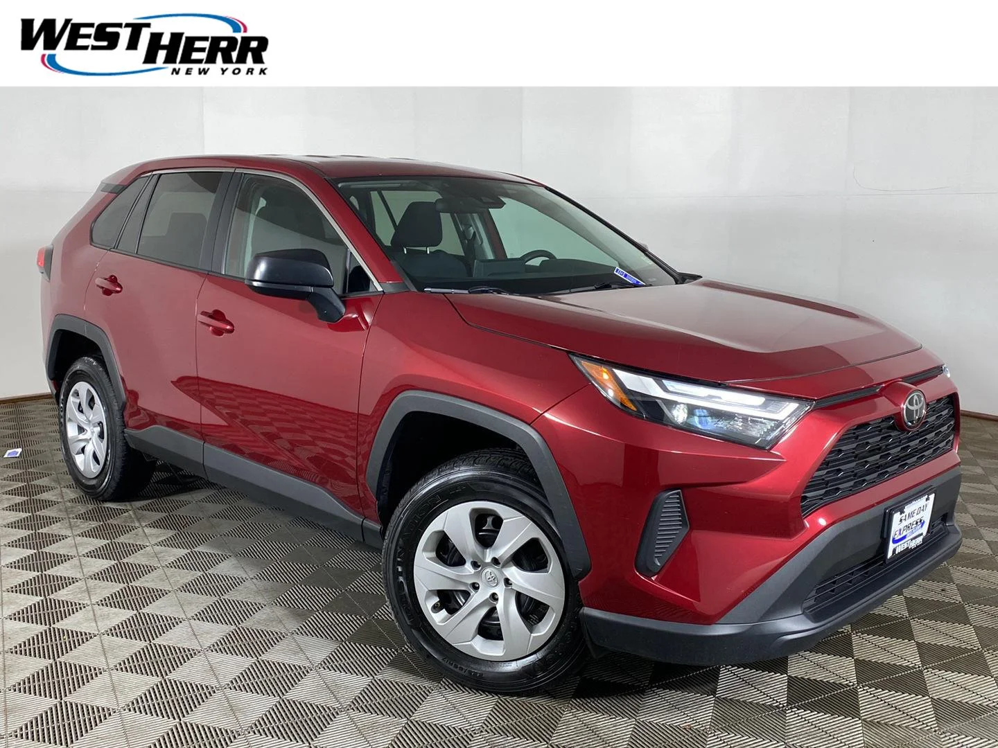 Used 2024 Ruby Flare Pearl Toyota LE image 1