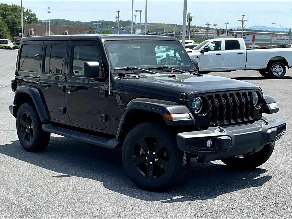 Used 2022 Black Jeep Unlimited Sahara Altitude image 1
