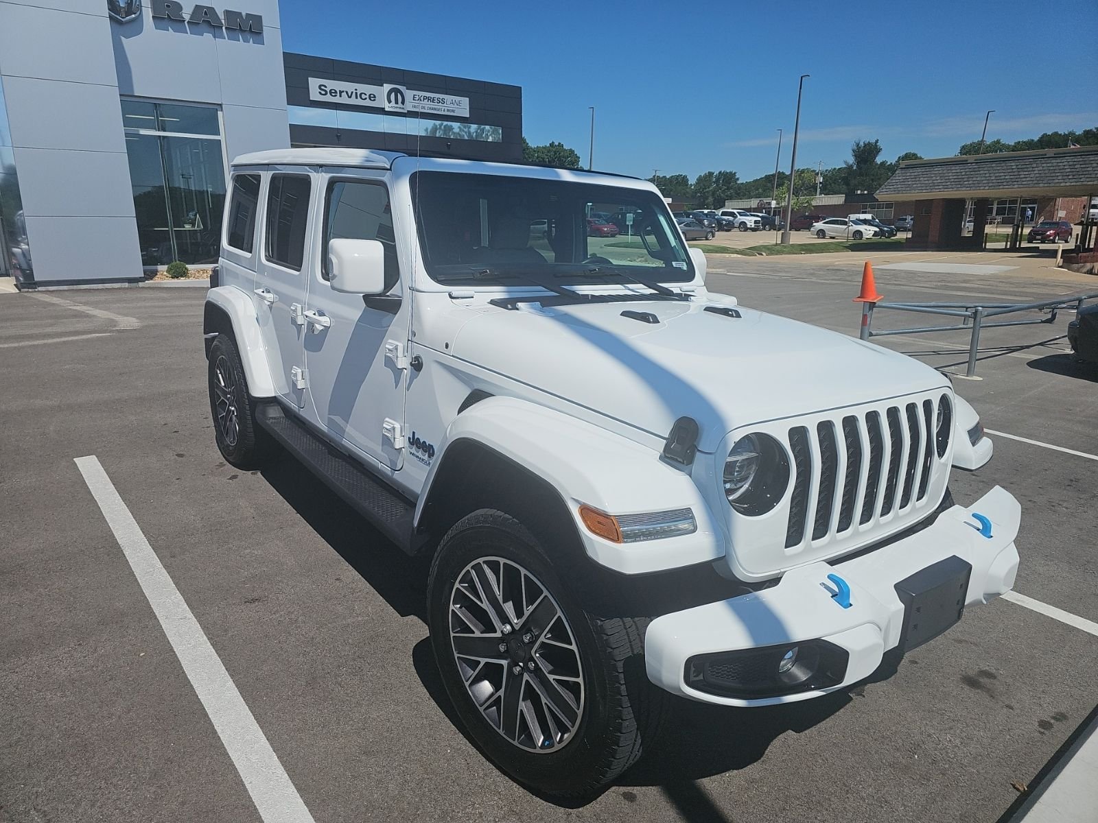 Used 2022 White Jeep Unlimited Sahara 4xe image 1