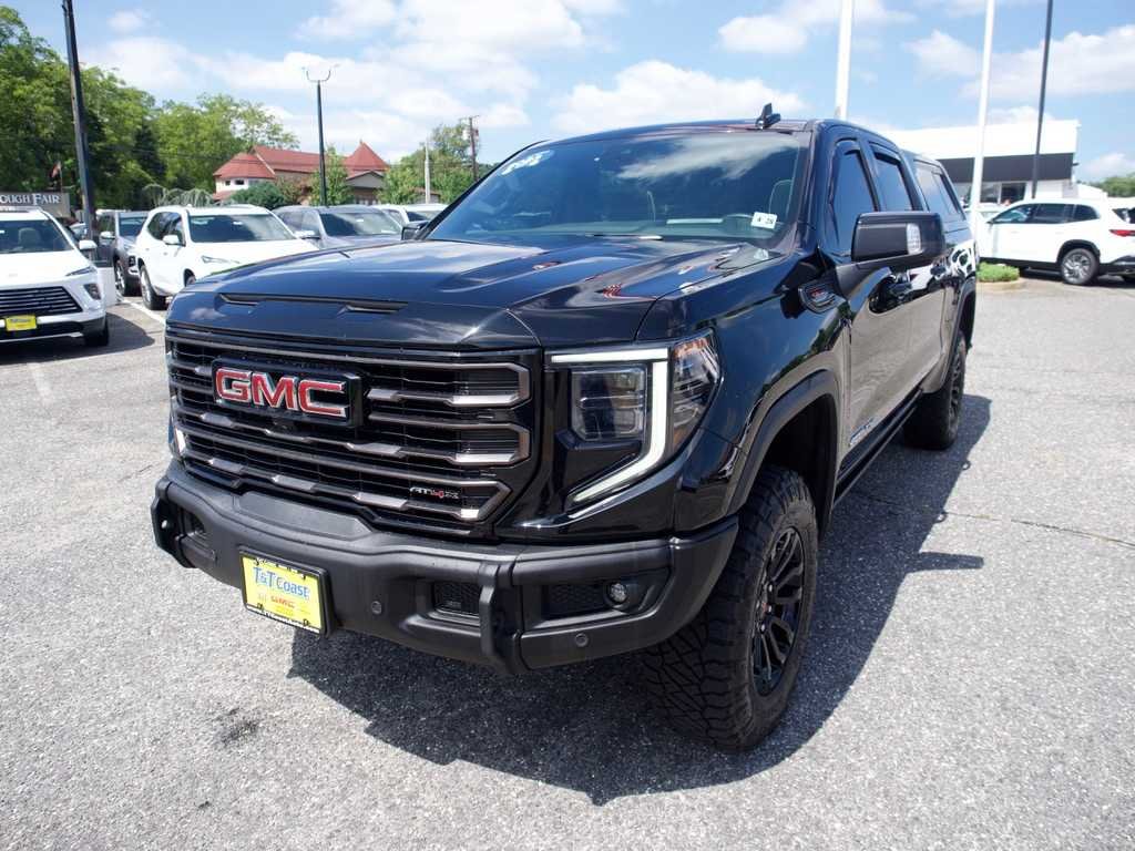Used 2023 ONYX BLACK GMC AT4X image 1