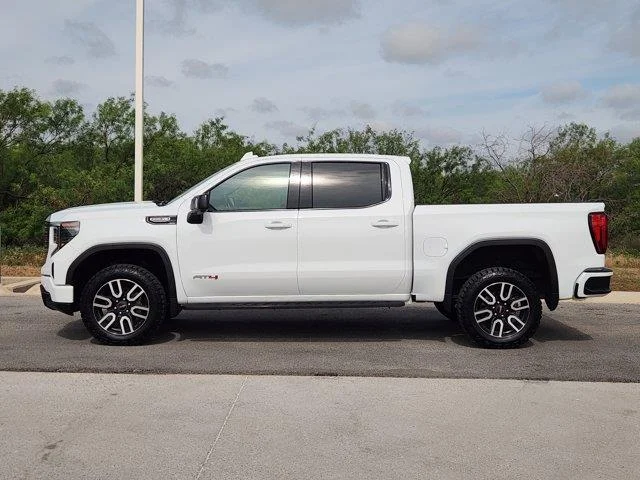 Used 2024 Summit White GMC AT4 4x4 Crew Cab 5.75 ft. box 147.4 in. WB image 3