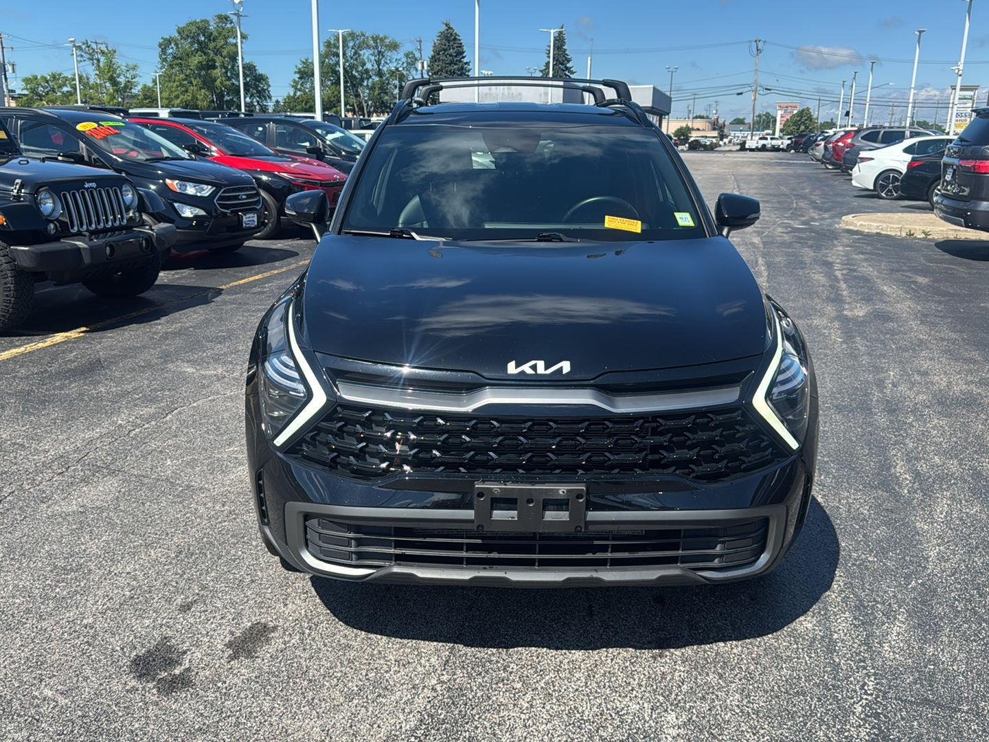 Used 2024 Ebony Black Kia X-Line image 2