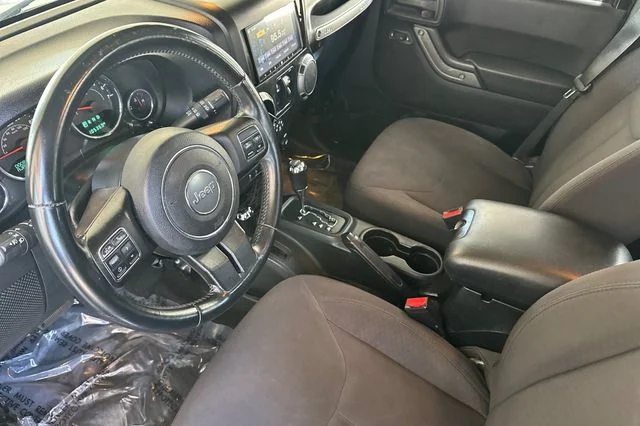 Used 2015 Black Clearcoat Jeep Unlimited Sport image 12