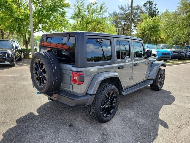 Used 2022 Jeep Wrangler Unlimited Sahara 4XE with VIN 1C4JJXP60NW106828 for sale in Jacksonville, FL