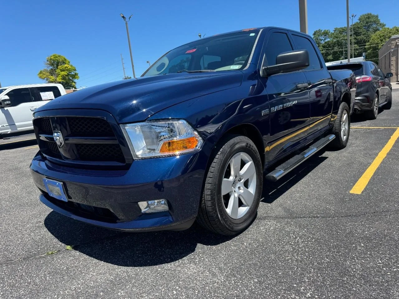 Used 2012 True Blue Pearlcoat Ram 2WD Crew Cab 140.5" Express image 3