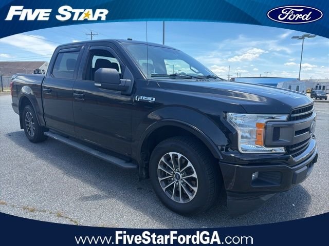 Used 2018 Black Ford XLT image 1