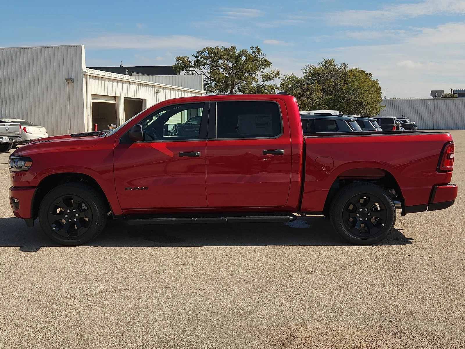 New 2026 Molten Red Pearl-Coat  Paint Ram EXPRESS CREW CAB 4X4 5