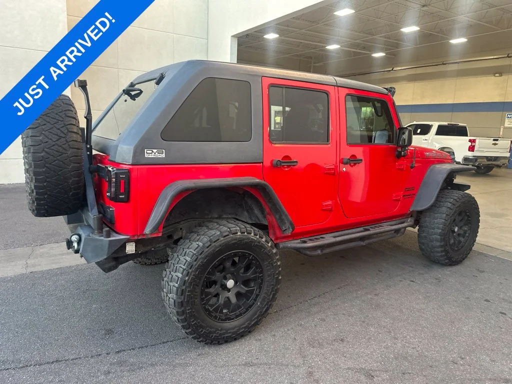Used 2017 Red Clearcoat Jeep Unlimited Sport image 3