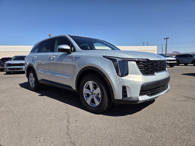 New 2026 Ivory Silver Kia LX image 2