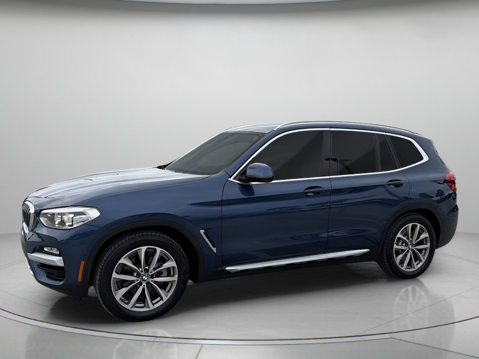 Used 2019 Phytonic Blue Metallic BMW xDrive30i image 1