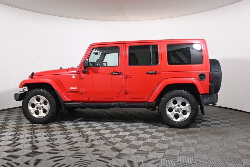 Used 2015 Jeep Wrangler Unlimited Sahara with VIN 1C4BJWEG9FL565059 for sale in Warwick, RI