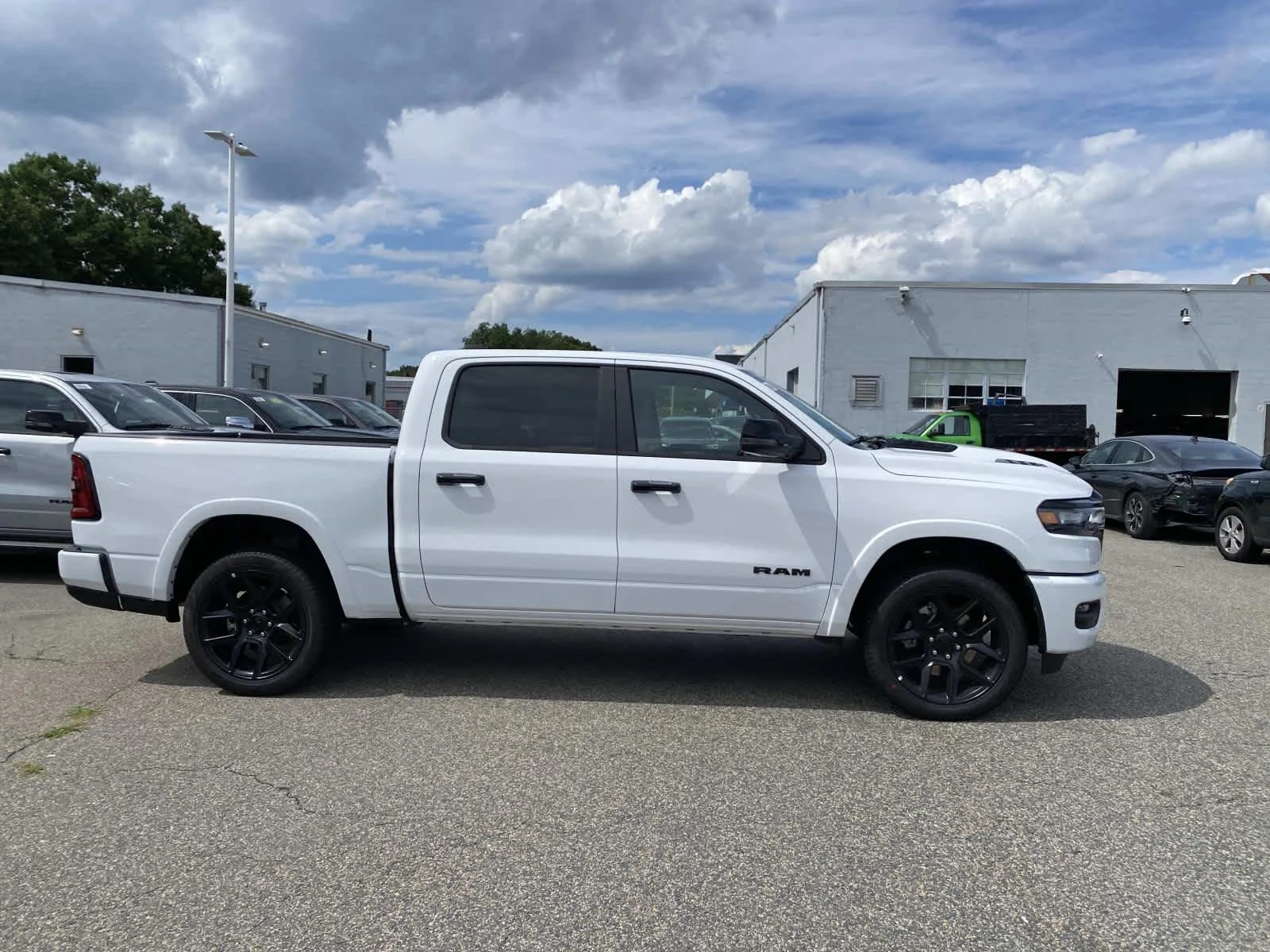 New 2026 Bright White Clear-Coat Exterior Paint RAM Laramie image 2