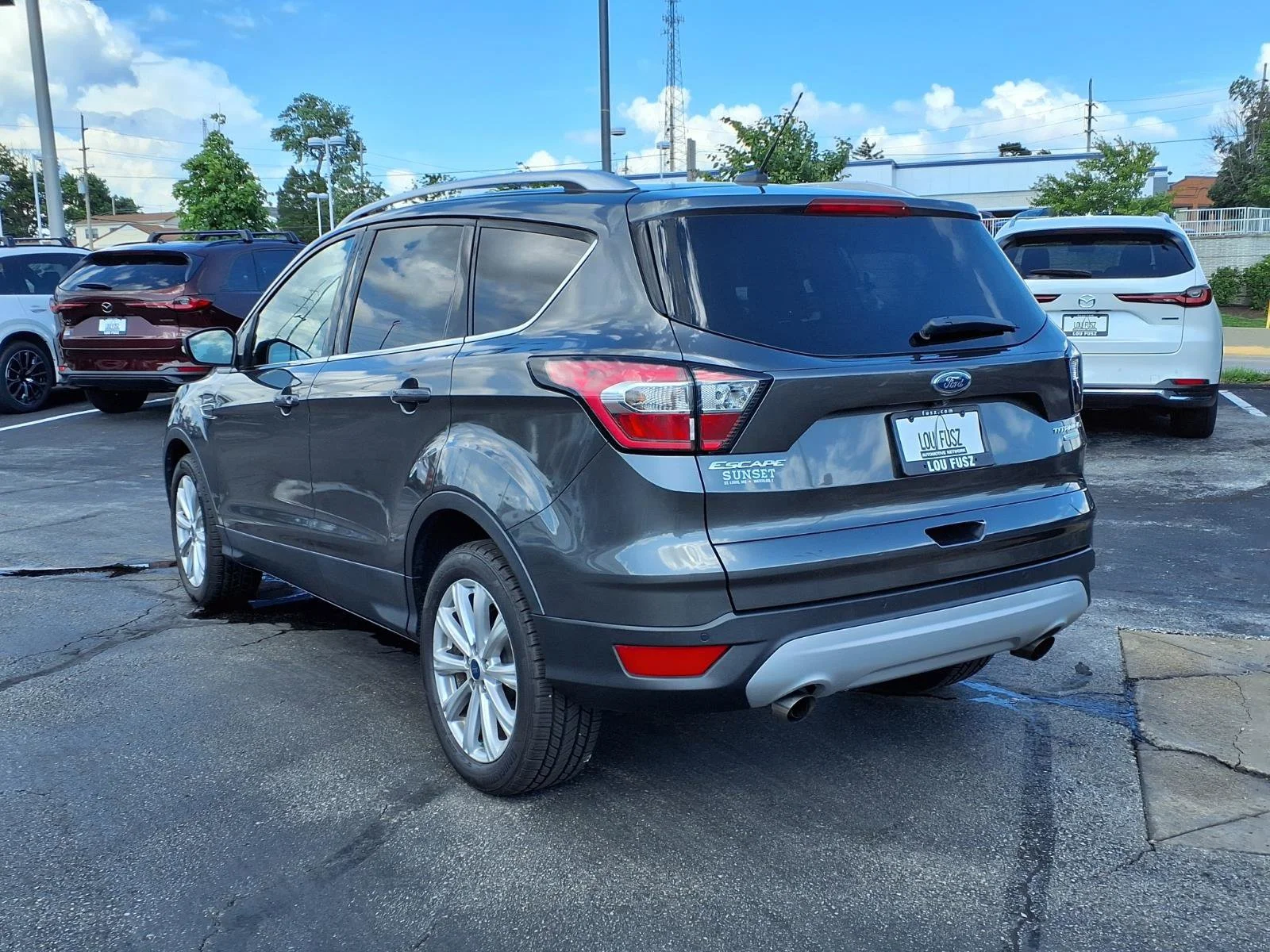 Used 2017 Ford Escape Titanium with VIN 1FMCU0JD5HUD66135 for sale in Creve Coeur, MO