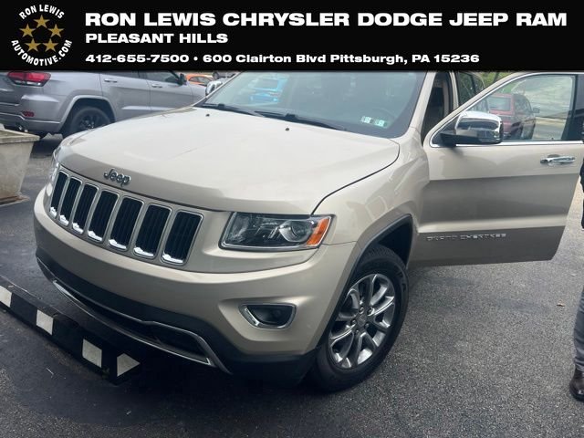 Used 2014 Beige Jeep Limited image 1