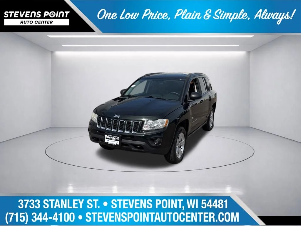 Used 2013 Black Forest Green Pearlcoat Jeep Latitude image 1
